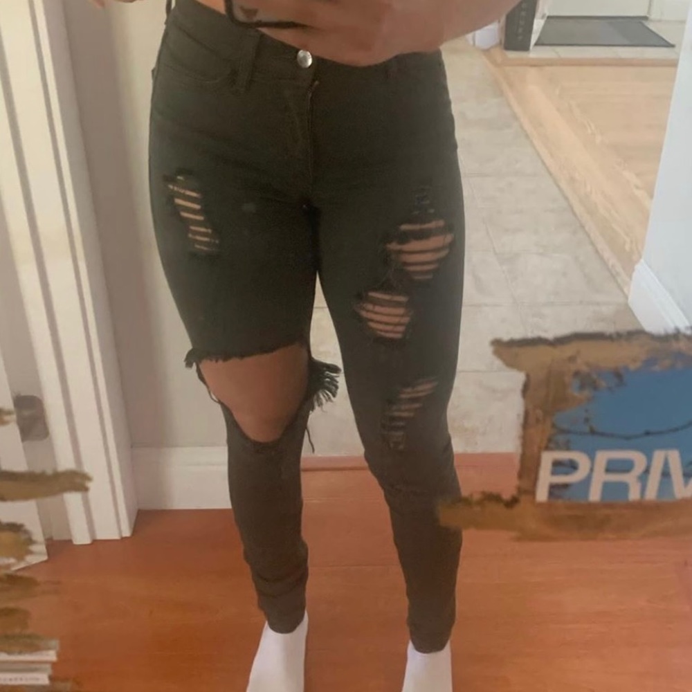 Ripped army green jeans